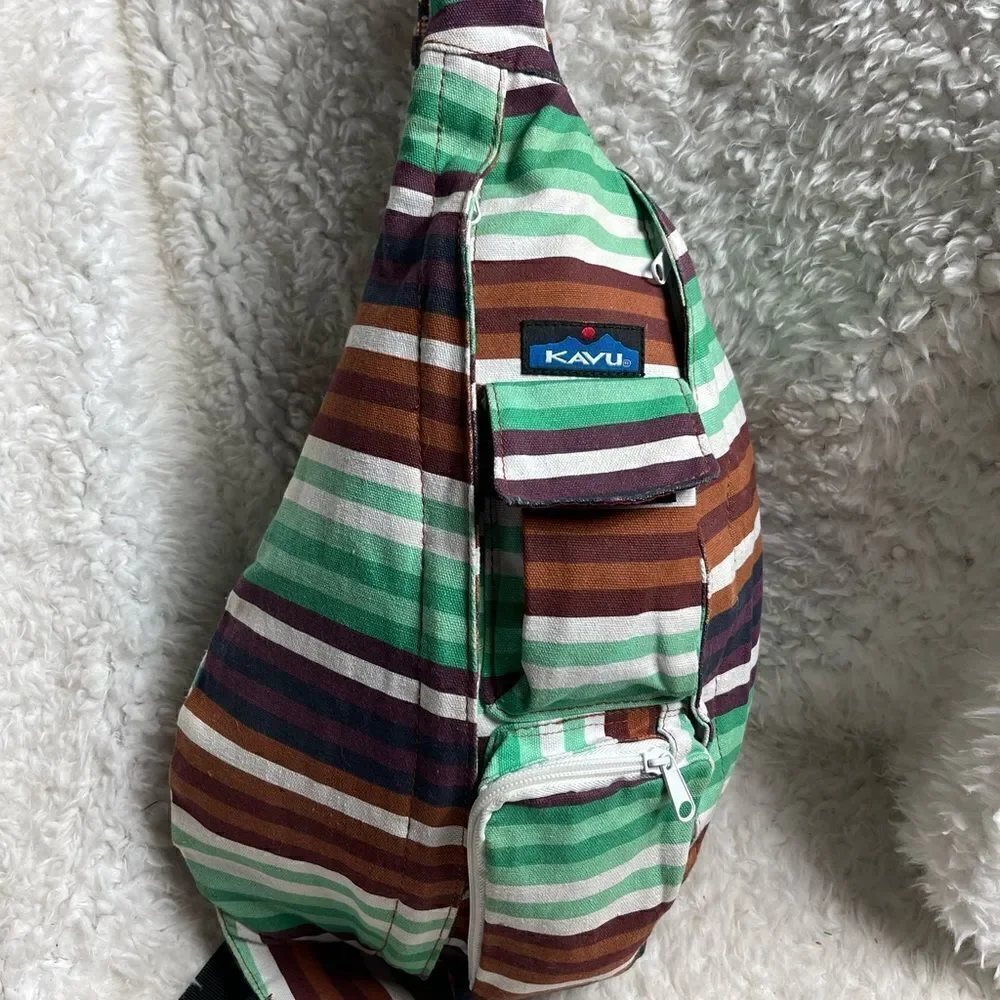 Kavu Rope sling back/ crossbody bag Canvas stripes Aztec color padded back .